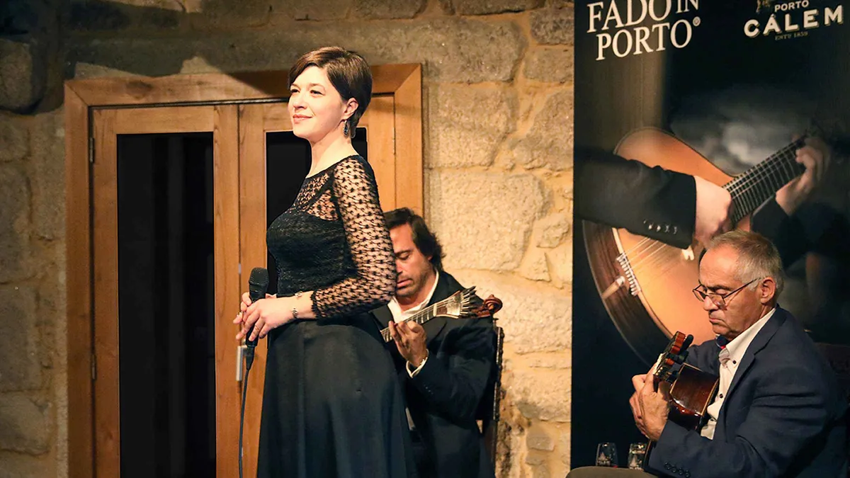 Cálem cellar with a live Fado performance on a port wine cellar tour in Vila Nova de Gaia, Porto, Portugal