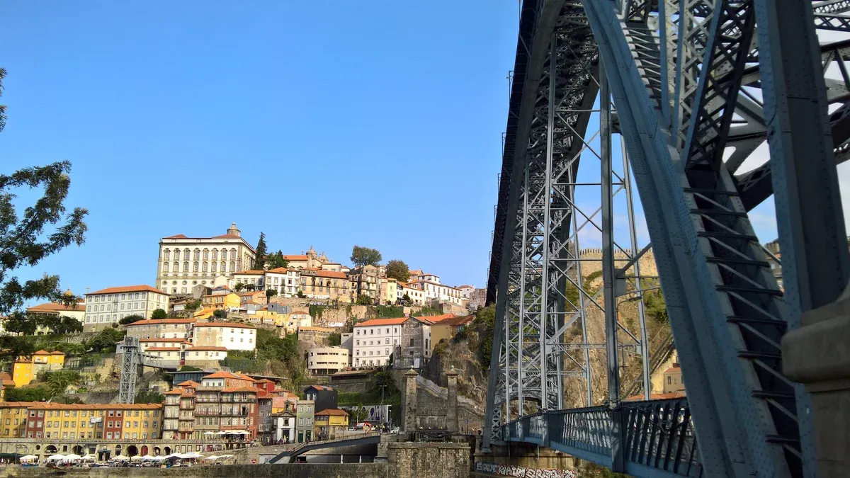 The iron arch of the Dom Luís I bridge from the Gaia bank, the Burmester side of the river, seen on a port wine cellar tour in Vila Nova de Gaia
